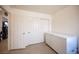 Bedroom featuring a double door closet, neutral paint and direct access to the rest of the home at 4616 E Idaho Ave, Las Vegas, NV 89104