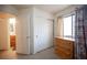 Bedroom featuring built in cabinets with views of an ensuite bath at 4616 E Idaho Ave, Las Vegas, NV 89104