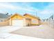 Inviting single-story house featuring a well-maintained exterior and a two-car garage at 4616 E Idaho Ave, Las Vegas, NV 89104