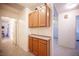 Hallway features upper and lower cabinets with modern style countertops at 4616 E Idaho Ave, Las Vegas, NV 89104