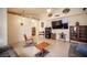 Cozy living room boasting tile flooring, ample seating, and a relaxing atmosphere at 4616 E Idaho Ave, Las Vegas, NV 89104