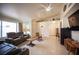 Inviting living room with tile floors, comfortable seating, and natural light at 4616 E Idaho Ave, Las Vegas, NV 89104