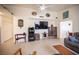 Spacious living room featuring a ceiling fan, tile flooring, and comfortable seating at 4616 E Idaho Ave, Las Vegas, NV 89104
