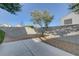 Backyard area with a tree, offering a private outdoor space at 4751 Lone Grove Dr, Las Vegas, NV 89139