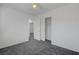 Bright bedroom with a view to a closet and a doorway at 4751 Lone Grove Dr, Las Vegas, NV 89139