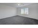 Spacious bedroom with carpet and a bright window at 4751 Lone Grove Dr, Las Vegas, NV 89139