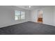 Bright bedroom featuring a large window and access to the ensuite bathroom at 4751 Lone Grove Dr, Las Vegas, NV 89139