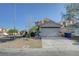 Charming two-story home with a spacious driveway and low maintenance landscaping at 4751 Lone Grove Dr, Las Vegas, NV 89139