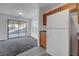 The kitchen and dining area has wood cabinets, gray countertops, and gray floors at 4751 Lone Grove Dr, Las Vegas, NV 89139