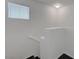 The staircase features carpeted stairs, white walls and a railing at 4751 Lone Grove Dr, Las Vegas, NV 89139