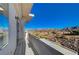 Relax on this balcony and admire the scenic desert and mountain views, with tile flooring and a bright, open feel at 483 Marina Cv, Boulder City, NV 89005