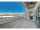Enjoy mountain and lake views from this balcony with tiled floors, ceiling fan, and easy access to the indoors at 483 Marina Cv, Boulder City, NV 89005