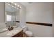 This bathroom features a granite countertop and tile flooring and walls at 483 Marina Cv, Boulder City, NV 89005