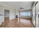 Bright living room features hardwood floors, a fireplace, and access to a private balcony with stunning views at 483 Marina Cv, Boulder City, NV 89005