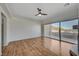 Spacious living room with modern flooring and a sliding glass door to a terrace at 483 Marina Cv, Boulder City, NV 89005