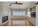 Living room features hardwood floors, a fireplace, and large windows offering abundant natural light and beautiful views at 483 Marina Cv, Boulder City, NV 89005