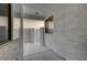 Enclosed patio with stucco walls, concrete flooring, and an entrance gate at 483 Marina Cv, Boulder City, NV 89005