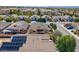 Residential neighborhood featuring tile roofs, solar panels, and well-maintained landscaping at 5817 Pirate Ship Dr, North Las Vegas, NV 89031