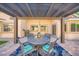 Outdoor covered patio with dining set at 5817 Pirate Ship Dr, North Las Vegas, NV 89031