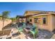Backyard with outdoor seating and a pergola at 5817 Pirate Ship Dr, North Las Vegas, NV 89031