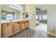 Bright bathroom with double vanity and ample counter space, providing a functional and stylish design at 5817 Pirate Ship Dr, North Las Vegas, NV 89031