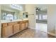 Well-lit bathroom with double sinks, offering a functional and modern design at 5817 Pirate Ship Dr, North Las Vegas, NV 89031
