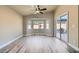 Bright dining room with a bay window and sliding glass door to patio at 5817 Pirate Ship Dr, North Las Vegas, NV 89031