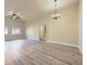 Bright, open living room with hardwood floors, neutral walls, and ample natural light at 5817 Pirate Ship Dr, North Las Vegas, NV 89031