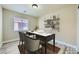 Office space includes a desk, chairs, and decor shelving at 5817 Pirate Ship Dr, North Las Vegas, NV 89031