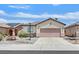 Charming single-story home with a neutral color scheme and a well-maintained front yard at 5918 Terra Grande Ave, Las Vegas, NV 89122