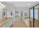 Bathroom featuring double sinks, a soaking tub and a glass enclosed shower at 5918 Terra Grande Ave, Las Vegas, NV 89122