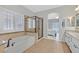 Spacious bathroom featuring a bathtub and a glass shower at 5918 Terra Grande Ave, Las Vegas, NV 89122