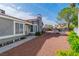 Inviting backyard featuring mature trees, lush landscaping, and an outdoor seating area perfect for relaxation at 6536 Pleasant Plains Way, Las Vegas, NV 89108
