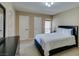Neutral bedroom with two white doors, including one leading to the bedroom closet at 668 Oakmont Ave # 1715, Las Vegas, NV 89109