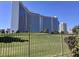 Exterior of a modern building, featuring sleek design and views of well-maintained lawns at 668 Oakmont Ave # 1715, Las Vegas, NV 89109