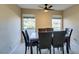 Inviting dining area offering picturesque views and comfortable seating for six at 668 Oakmont Ave # 1715, Las Vegas, NV 89109