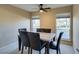 Well-lit dining space with comfortable seating and views of the landscaped surroundings at 668 Oakmont Ave # 1715, Las Vegas, NV 89109