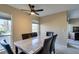 Bright dining area featuring a stylish table, comfortable seating, and natural light from the windows at 668 Oakmont Ave # 1715, Las Vegas, NV 89109