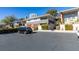 Well-maintained complex featuring brick accents, mature landscaping and ample parking spaces at 668 Oakmont Ave # 1715, Las Vegas, NV 89109