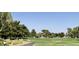 Expansive golf course view with mature trees and manicured greens, a golfer's paradise at 668 Oakmont Ave # 1715, Las Vegas, NV 89109