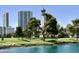 Scenic view of the lush golf course with serene water features, showcasing the community's amenities at 668 Oakmont Ave # 1715, Las Vegas, NV 89109