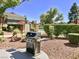 Outdoor grill area featuring a modern grill and pleasant surroundings for community cookouts at 668 Oakmont Ave # 1715, Las Vegas, NV 89109