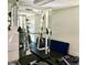 Weightlifting equipment and mirrors in the fitness center of the community at 668 Oakmont Ave # 1715, Las Vegas, NV 89109