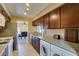 The kitchen is updated with granite countertops and stainless steel appliances with the dining room adjacent at 668 Oakmont Ave # 1715, Las Vegas, NV 89109