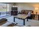 Inviting living room featuring a comfortable sofa and sliding glass door to a patio at 668 Oakmont Ave # 1715, Las Vegas, NV 89109