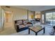 Inviting living room offers plenty of natural light and enough space for entertaining friends at 668 Oakmont Ave # 1715, Las Vegas, NV 89109