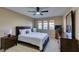 The main bedroom features a ceiling fan, natural light, and neutral tones creating a relaxing and inviting atmosphere at 668 Oakmont Ave # 1715, Las Vegas, NV 89109