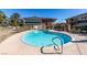 Inviting outdoor pool featuring a pristine blue hue and accessible steps at 668 Oakmont Ave # 1715, Las Vegas, NV 89109