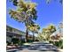 Charming street with neatly maintained townhomes and mature trees, showcasing a peaceful residential setting at 668 Oakmont Ave # 1715, Las Vegas, NV 89109