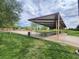 Community picnic pavilion offers shady seating with picturesque common area views at 709 Pickled Pepper Pl, Henderson, NV 89011